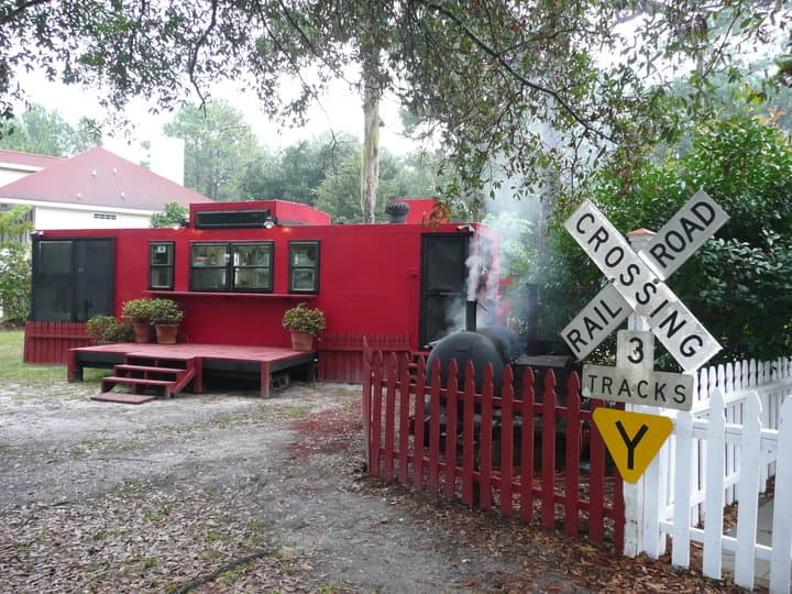 The red caboose exterior at Choo-Choo BBQ